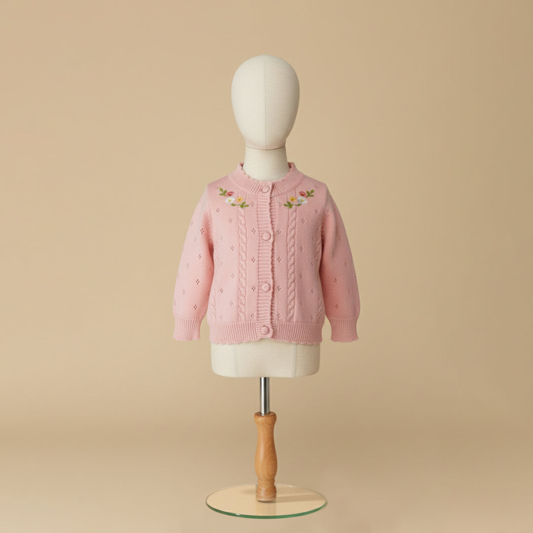 Light dusty pink cardigan with floral embroidery on mannequin display