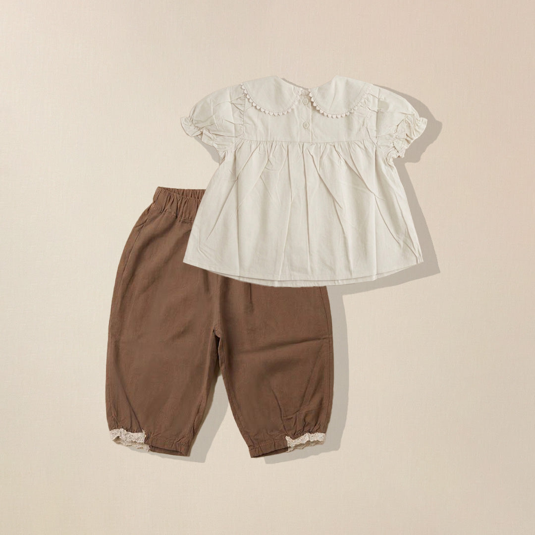 Back view of scalloped collar top and brown pants co-ord set