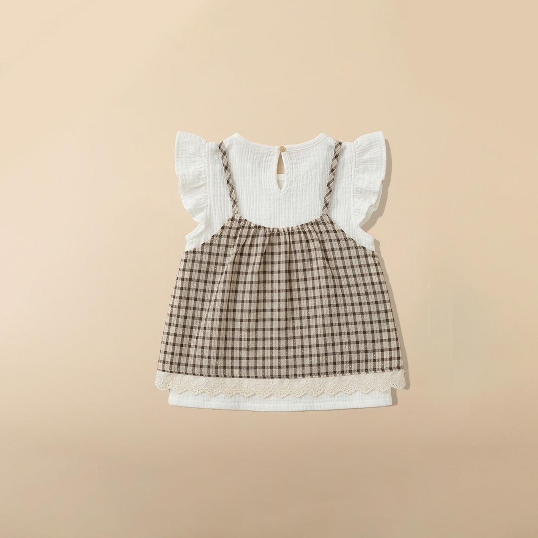Back view of white ruffle sleeve top with beige and brown gingham layered design 
