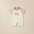 Cream romper with rust striped sleeves and elephant print for babies