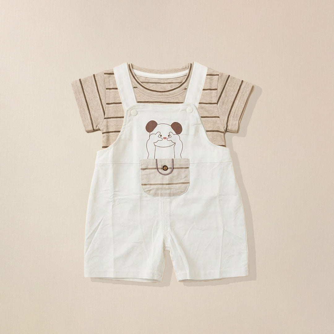 Children's outfit with white dungaree shorts featuring a cartoon dog design paired with strip t-shirt.