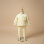 Sunny yellow quilted baby jacket and pants set on mannequin display