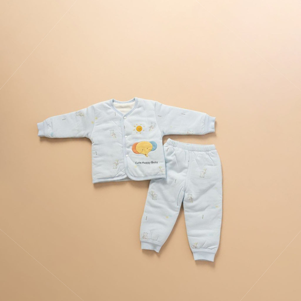 Sky blue quilted baby jacket and pants set with elephant print, flat lay