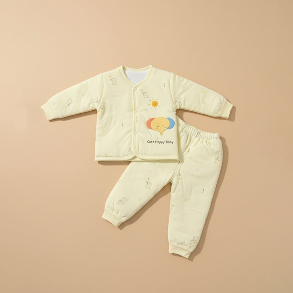 Sunny yellow quilted baby jacket and pants set with elephant print, flat lay