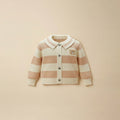 Pink and cream striped cardigan with teddy bear patch, flat lay