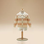 Pink and cream striped cardigan with collar and teddy patch on mannequin