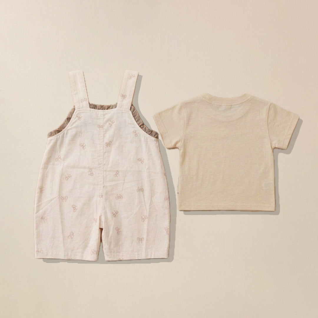 Back view of beige bow print dungaree with matching t-shirt for babies