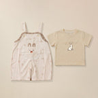 Beige dungaree with bunny ear pocket and cream bunny print t-shirt