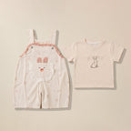 Pink dungaree with bunny ear pocket and cream bunny print t-shirt